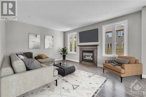 254 Terrapin Terrace, Ottawa, ON - Indoor Photo Showing Living Room With Fireplace