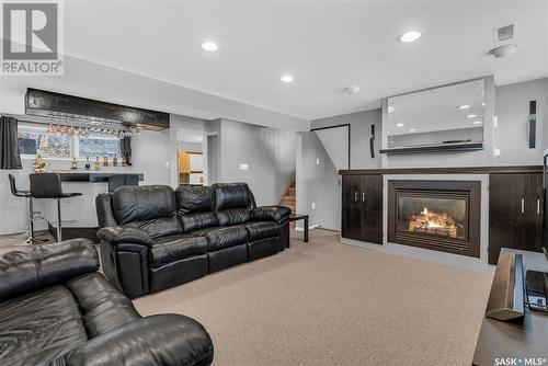 1626 Mckercher Drive, Saskatoon, SK - Indoor Photo Showing Living Room With Fireplace