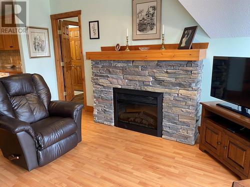 701 14A Crescent Unit# 325, Invermere, BC - Indoor Photo Showing Living Room With Fireplace