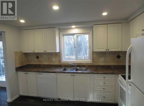 Upper - 18 Chippawa Court, Barrie, ON - Indoor Photo Showing Kitchen With Double Sink