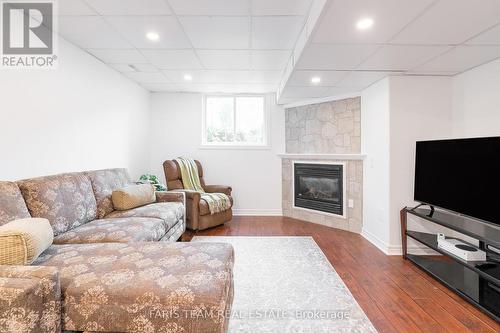 27 Garrett Crescent, Barrie, ON - Indoor Photo Showing Living Room With Fireplace