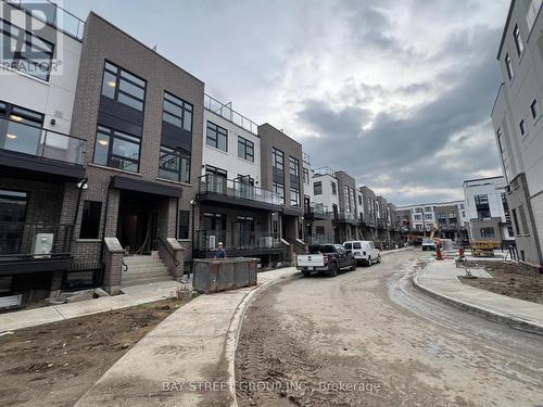 111 - 1573 Rose Way, Milton, ON - Outdoor With Facade