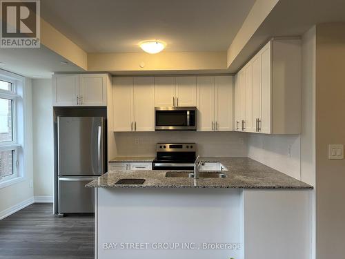 111 - 1573 Rose Way, Milton, ON - Indoor Photo Showing Kitchen With Stainless Steel Kitchen With Upgraded Kitchen