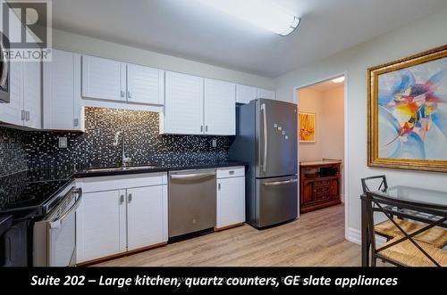 202 - 1400 Dixie Road, Mississauga, ON - Indoor Photo Showing Kitchen