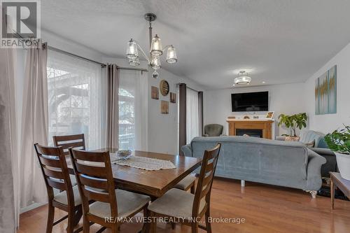 1059 Greenwood Park, Kingston, ON - Indoor Photo Showing Dining Room With Fireplace