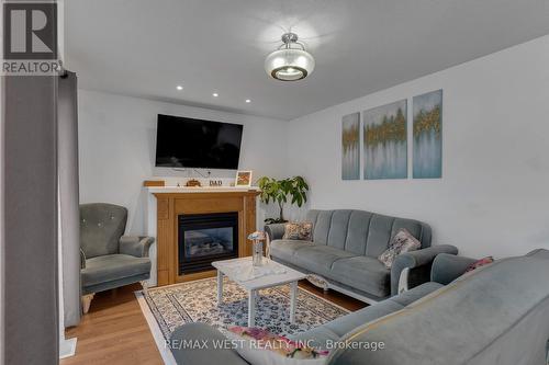 1059 Greenwood Park, Kingston, ON - Indoor Photo Showing Living Room With Fireplace