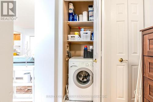 702 - 293 Mohawk Road E, Hamilton, ON - Indoor Photo Showing Laundry Room