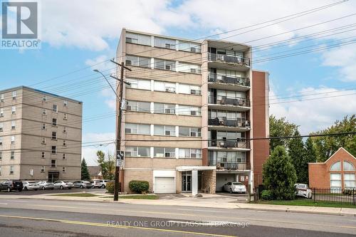 702 - 293 Mohawk Road E, Hamilton, ON - Outdoor With Facade