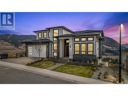 Welcome to 647 Carnoustie! - 647 Carnoustie Drive, Kelowna, BC - Outdoor With Facade