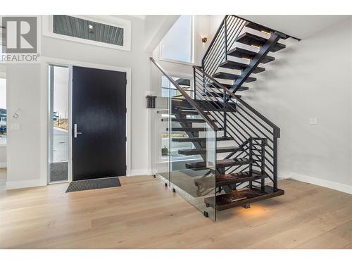 Stunning ""Solid Oak"" Stairs - 647 Carnoustie Drive, Kelowna, BC - Indoor Photo Showing Other Room