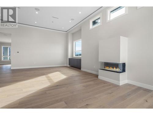 Main Living Room - Gas Fireplace - 647 Carnoustie Drive, Kelowna, BC - Indoor With Fireplace