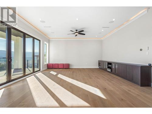 Family Room, Ceiling Rope Lighting, Built In Speakers, Built in Hutch - 647 Carnoustie Drive, Kelowna, BC - Indoor Photo Showing Other Room