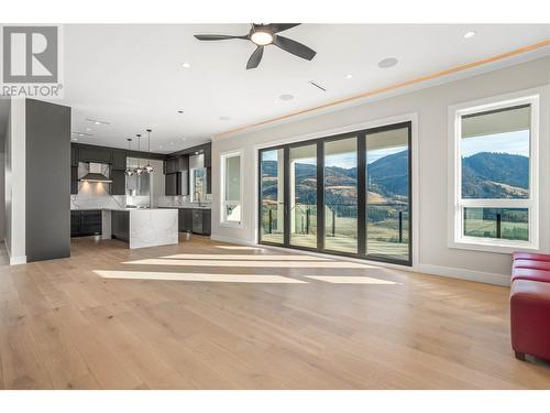 Virtually Staged! - 647 Carnoustie Drive, Kelowna, BC - Indoor Photo Showing Living Room