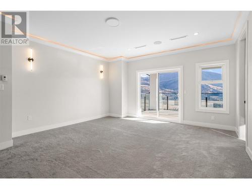 Top Floor Foyer - 647 Carnoustie Drive, Kelowna, BC - Indoor Photo Showing Other Room