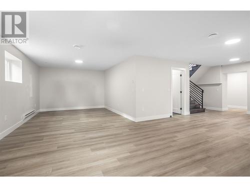 Main Home Laundry - 647 Carnoustie Drive, Kelowna, BC - Indoor Photo Showing Other Room