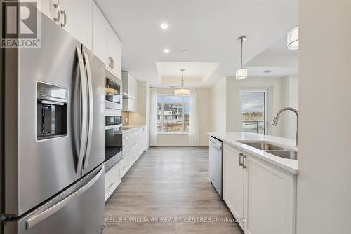 303 - 460 William Graham Drive, Aurora, ON - Indoor Photo Showing Kitchen With Double Sink With Upgraded Kitchen