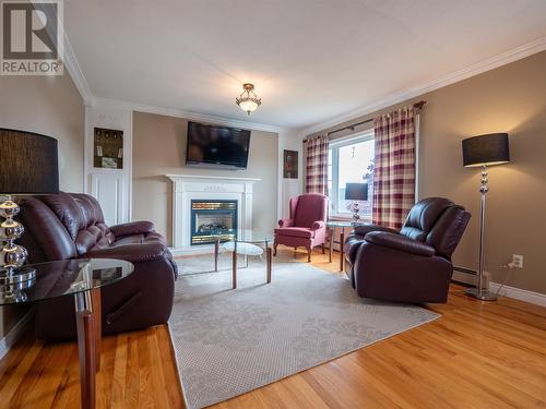 122 Southside Road, Bay Bulls, NL - Indoor Photo Showing Living Room With Fireplace