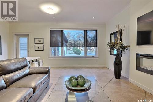 6 1651 Anson Road, Regina, SK - Indoor Photo Showing Living Room With Fireplace