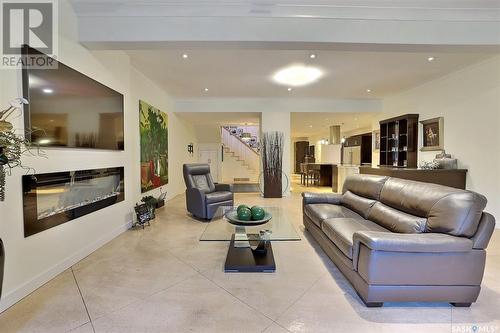 6 1651 Anson Road, Regina, SK - Indoor Photo Showing Living Room With Fireplace