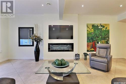 6 1651 Anson Road, Regina, SK - Indoor Photo Showing Living Room With Fireplace