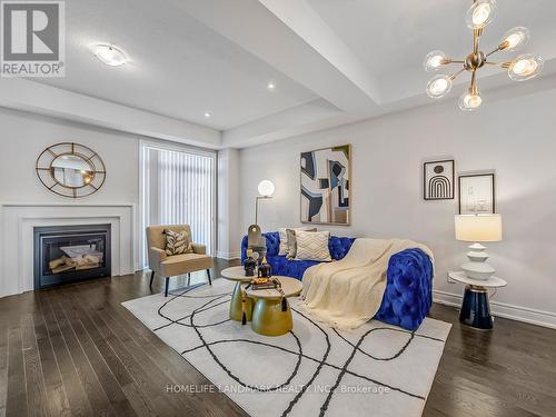 100 Christine Elliott Avenue, Whitby, ON - Indoor Photo Showing Living Room With Fireplace