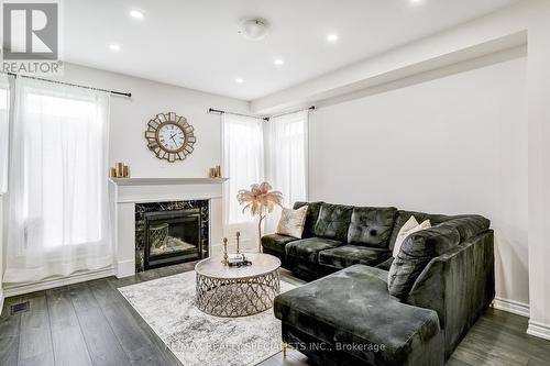 90 Ferragine Crescent, Bradford West Gwillimbury, ON - Indoor Photo Showing Living Room With Fireplace