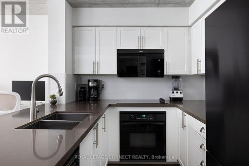 705 - 311 Richmond Street E, Toronto, ON - Indoor Photo Showing Kitchen With Double Sink