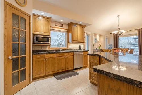 61 Carleton Drive, Steinbach, MB - Indoor Photo Showing Kitchen With Double Sink