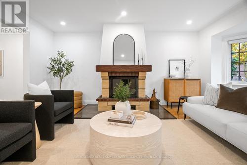 90 Sutherland Drive, Toronto, ON - Indoor Photo Showing Living Room With Fireplace