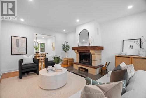 90 Sutherland Drive, Toronto, ON - Indoor Photo Showing Living Room With Fireplace