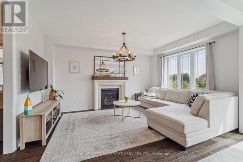 21 Mckay Avenue, New Tecumseth, ON - Indoor Photo Showing Living Room With Fireplace