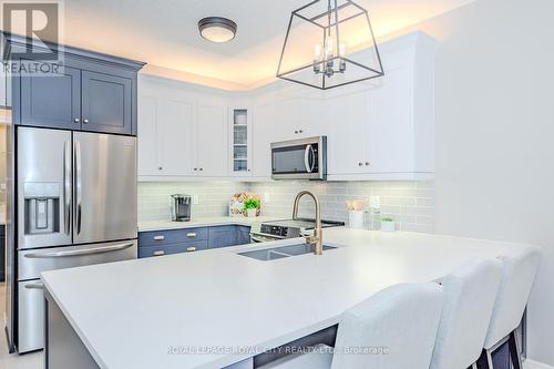 21 - 254 Summerfield Drive, Guelph, ON - Indoor Photo Showing Kitchen With Double Sink With Upgraded Kitchen