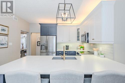 21 - 254 Summerfield Drive, Guelph, ON - Indoor Photo Showing Kitchen With Double Sink With Upgraded Kitchen