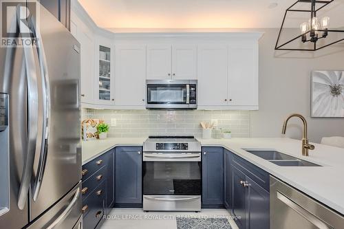 21 - 254 Summerfield Drive, Guelph, ON - Indoor Photo Showing Kitchen With Double Sink With Upgraded Kitchen