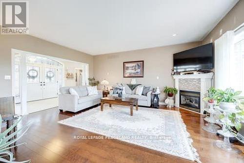 134 Southcrest Drive, Kawartha Lakes, ON - Indoor Photo Showing Living Room With Fireplace