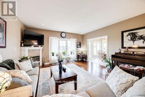 134 Southcrest Drive, Kawartha Lakes, ON - Indoor Photo Showing Living Room With Fireplace