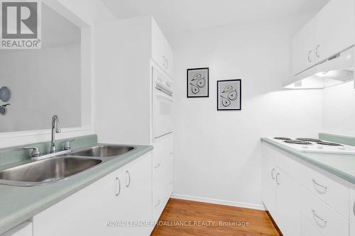 213 - 175 Haig Road E, Belleville, ON - Indoor Photo Showing Kitchen With Double Sink