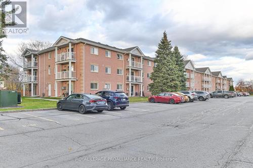 213 - 175 Haig Road E, Belleville, ON - Outdoor With Balcony With Facade