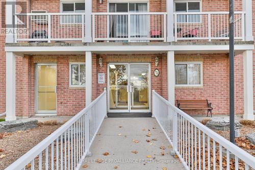 213 - 175 Haig Road E, Belleville, ON - Outdoor With Balcony With Facade