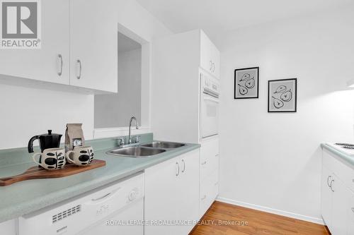 213 - 175 Haig Road E, Belleville, ON - Indoor Photo Showing Kitchen With Double Sink