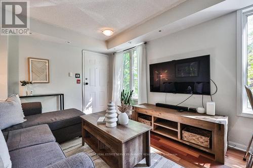 1233B - 22 Laidlaw Street, Toronto, ON - Indoor Photo Showing Living Room