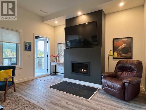 700 Riverside Way Unit# 201, Fernie, BC - Indoor Photo Showing Living Room With Fireplace