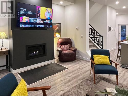 700 Riverside Way Unit# 201, Fernie, BC - Indoor Photo Showing Living Room With Fireplace