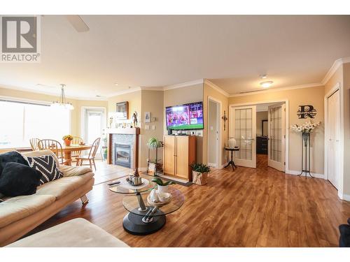 6805 Cottonwood Drive Unit# 400, Osoyoos, BC - Indoor Photo Showing Living Room With Fireplace