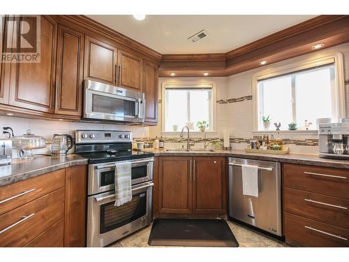 6805 Cottonwood Drive Unit# 400, Osoyoos, BC - Indoor Photo Showing Kitchen With Double Sink