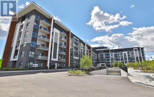 334 - 128 Grovewood Common, Oakville, ON - Outdoor With Balcony With Facade