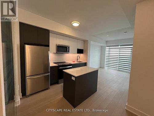 1410 - 202 Burnhamthorpe Road E, Mississauga, ON - Indoor Photo Showing Kitchen With Stainless Steel Kitchen