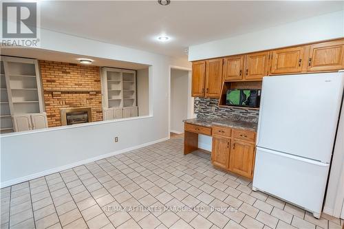 6324 Purcell Road, South Glengarry, ON - Indoor Photo Showing Kitchen With Fireplace