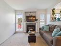 405-2310 Trent St, Victoria, BC  - Indoor Photo Showing Living Room With Fireplace 