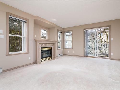 306-320 Menzies St, Victoria, BC - Indoor Photo Showing Living Room With Fireplace